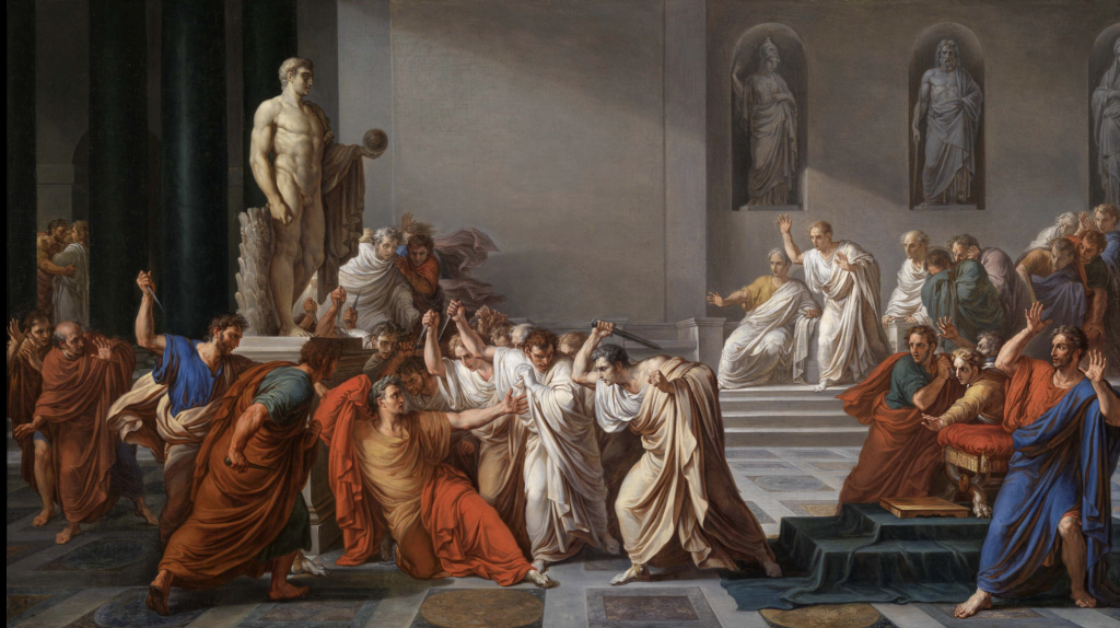 Several senators surround Julius Caesar with knives.